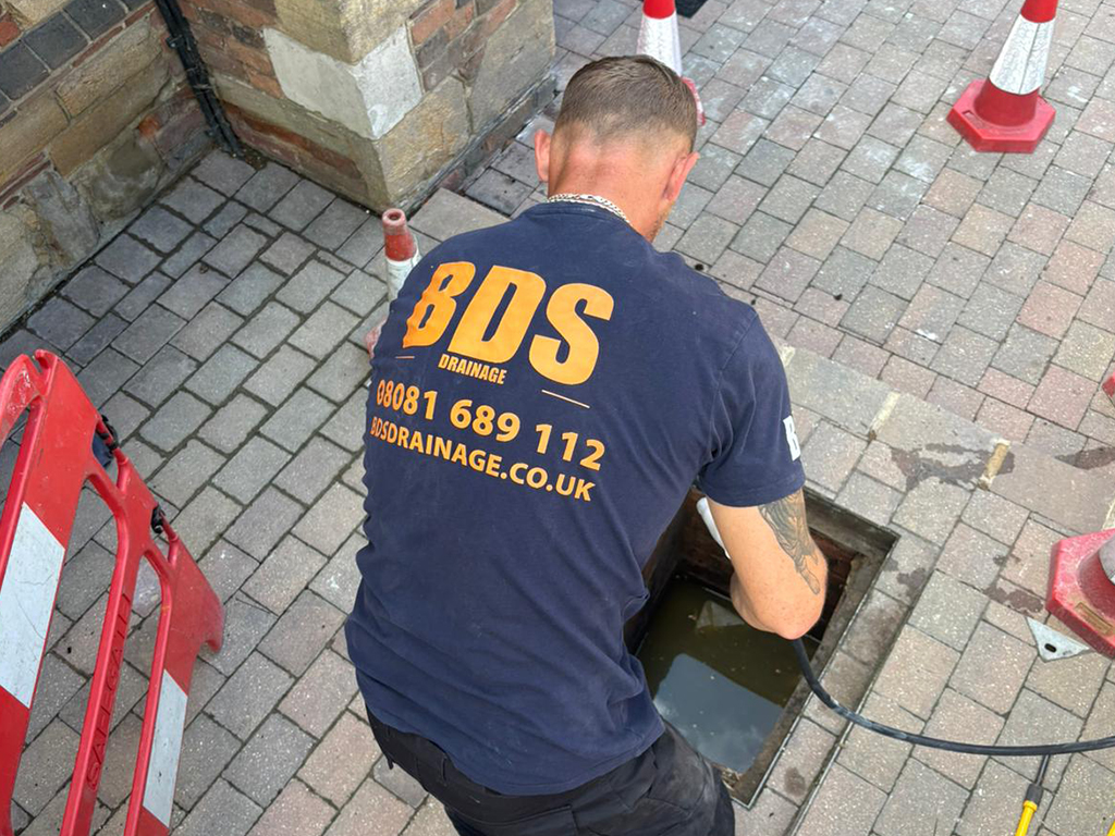 uncovered drain blocked and overflowing in Kent